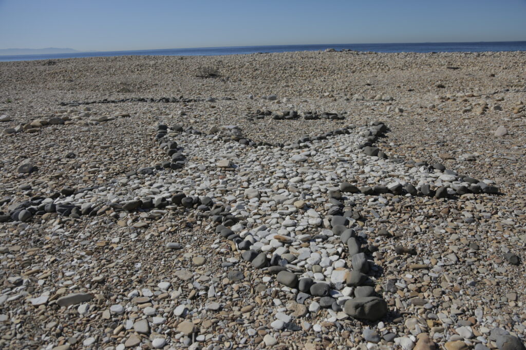 Stone art on a beach in South Bay